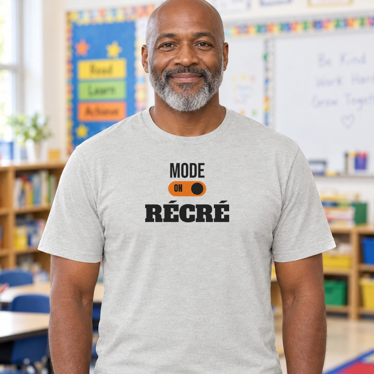 Man wearing the ash Mode récré graphic tee