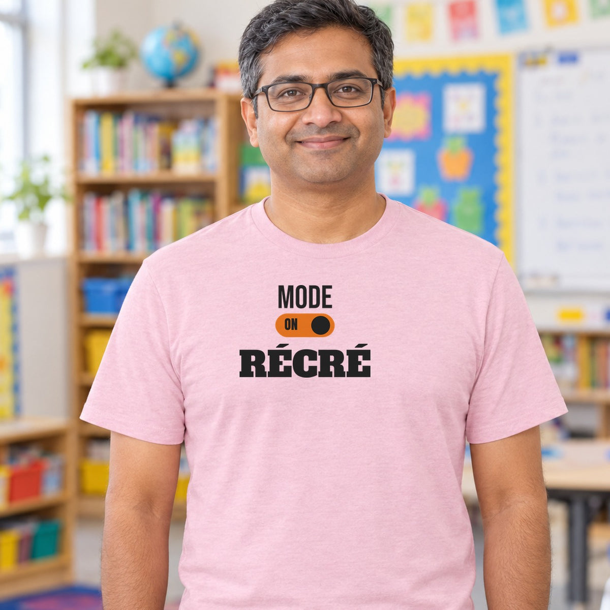Man wearing the light pink Mode récré graphic tee