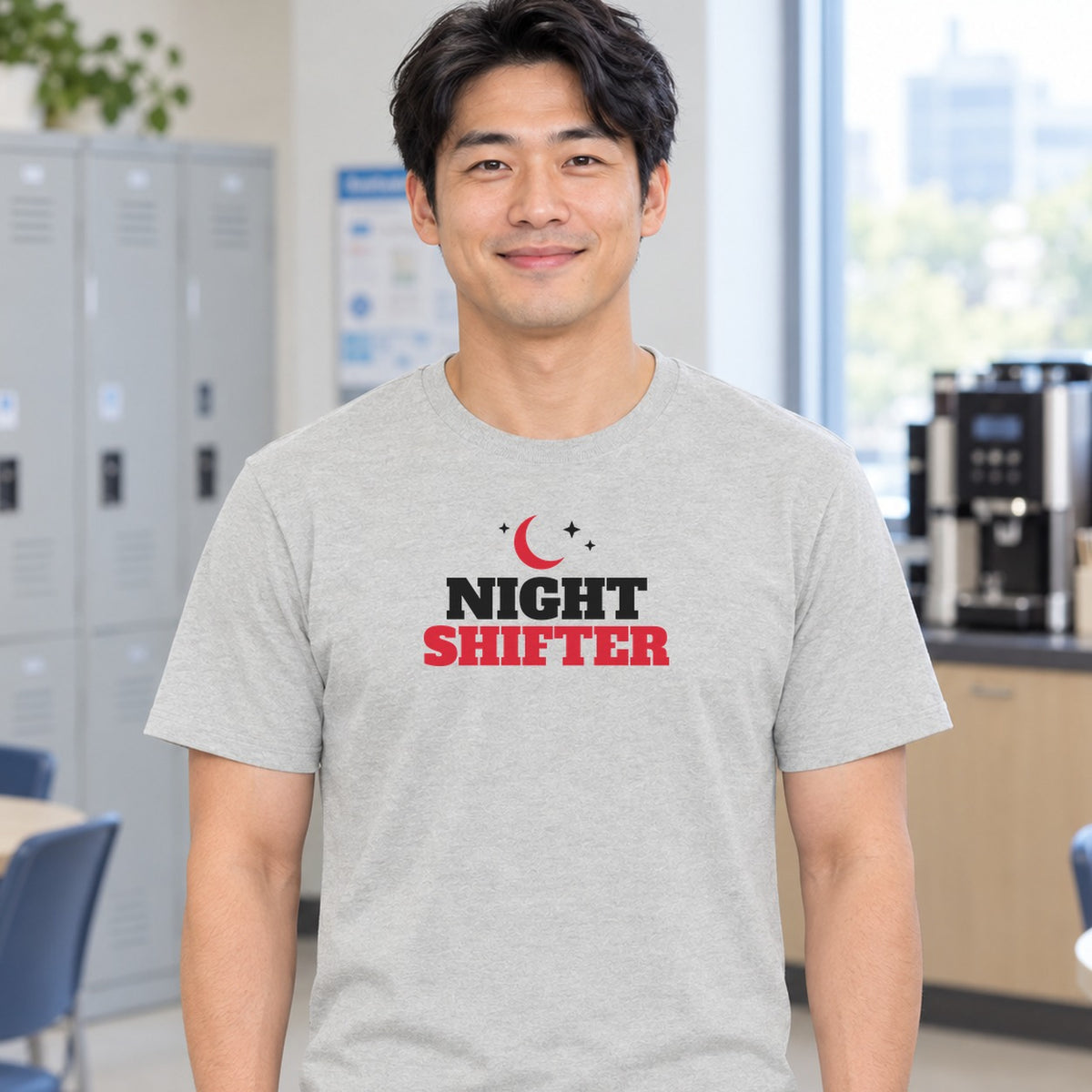 Man wearing the ash Night Shifter graphic tee