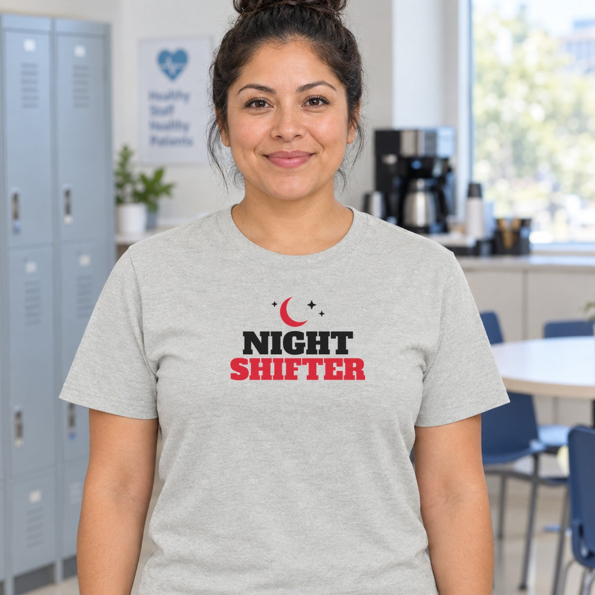 Woman wearing the ash Night Shifter graphic tee