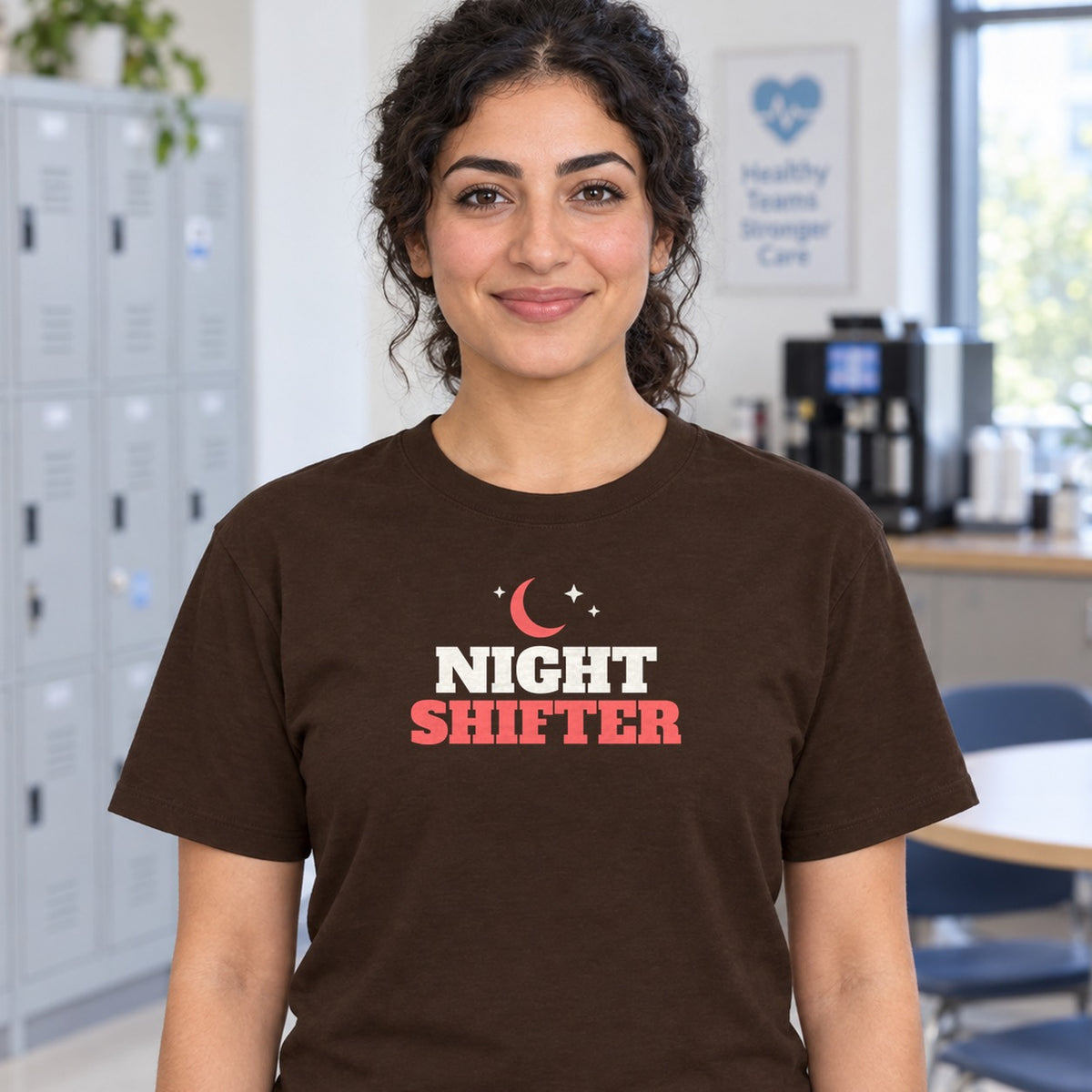 Woman wearing the dark chocolate Night Shifter graphic tee