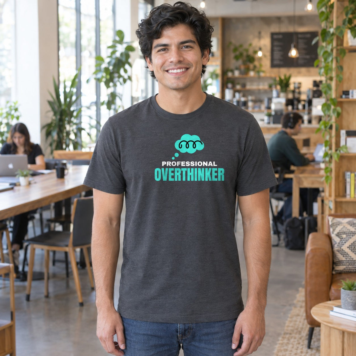 Man wearing the charcoal Professional Overthinker graphic tee