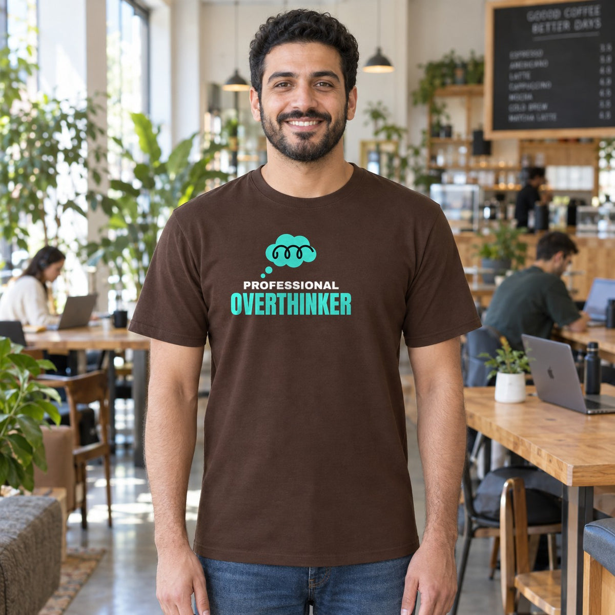 Man wearing the dark chocolate Professional Overthinker graphic tee