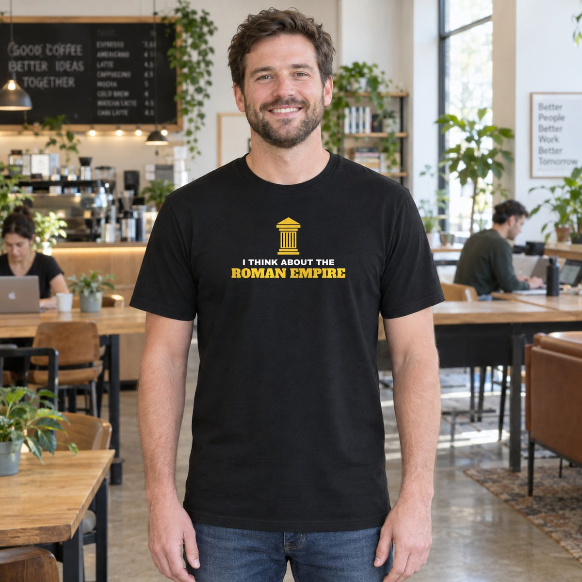 Man wearing the black Roman Empire graphic tee