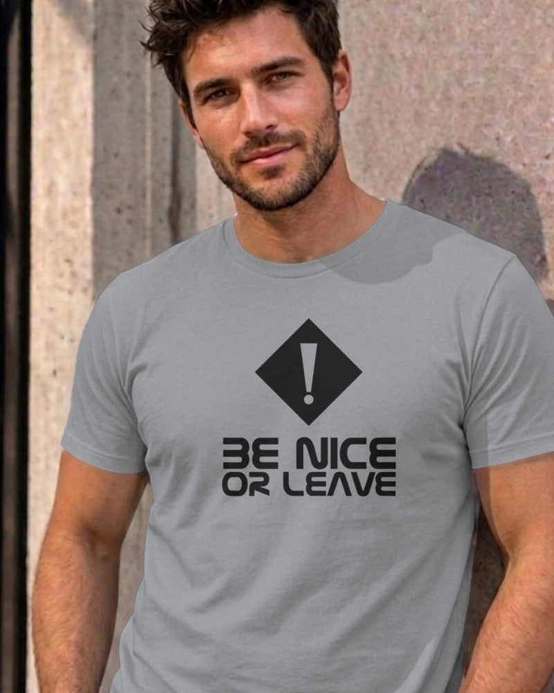 Man wearing the sport grey Be Nice or Leave graphic tee