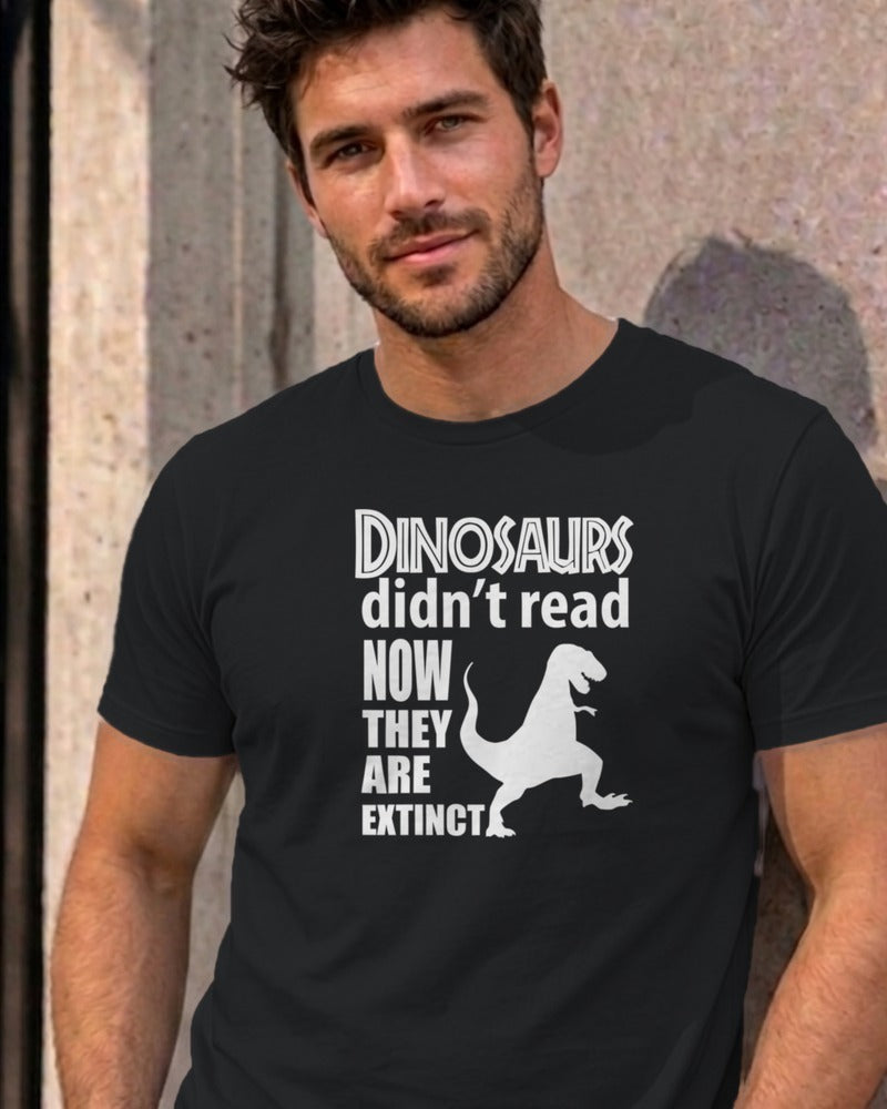 Man wearing the black Dinosaurs Didn't Read graphic tee