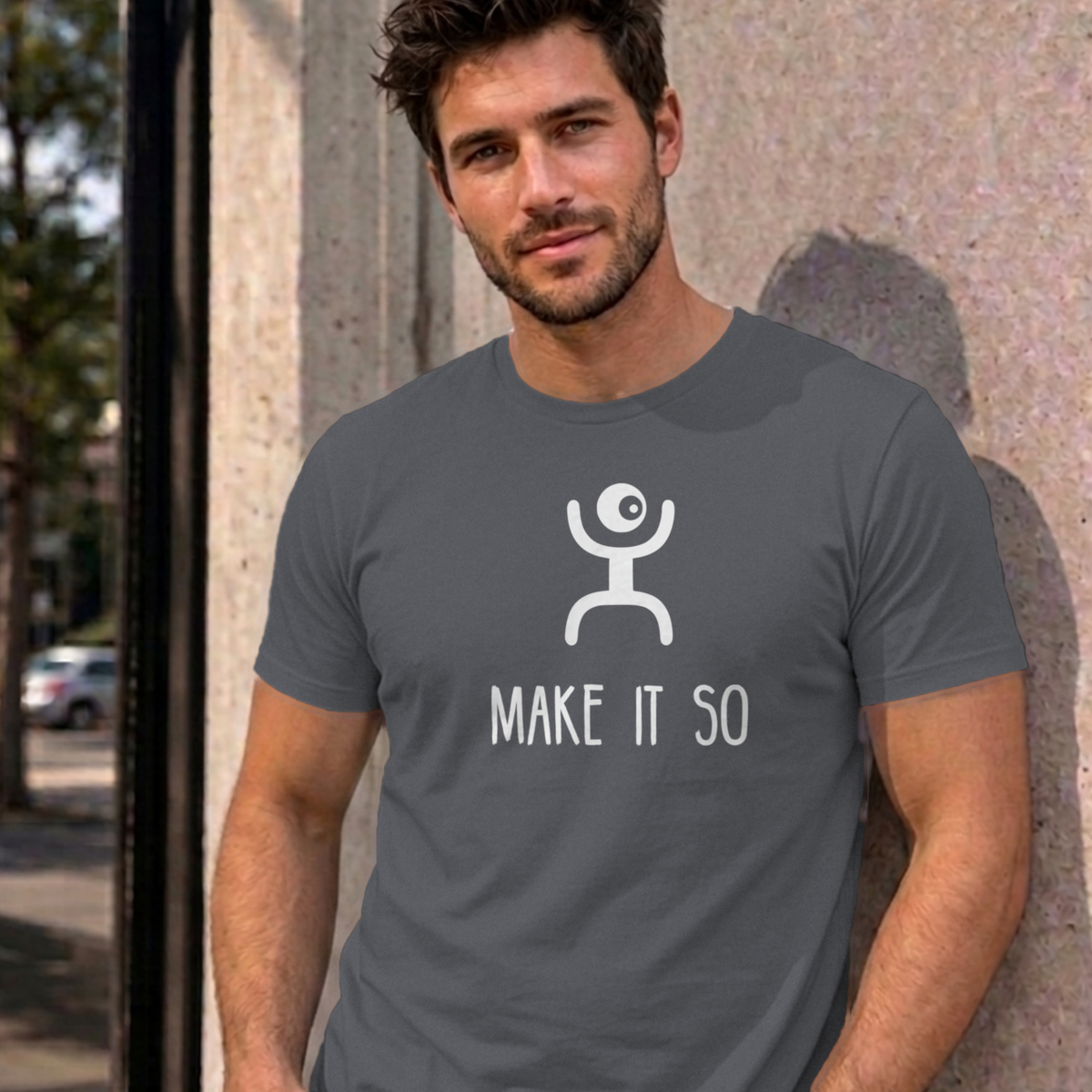 Man wearing the charcoal Make It So graphic tee