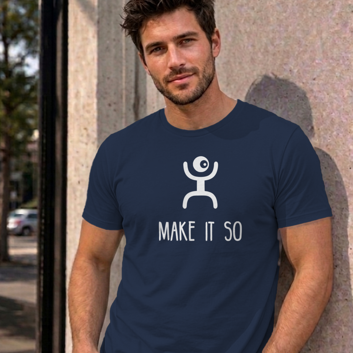 Man wearing the navy Make It So graphic tee