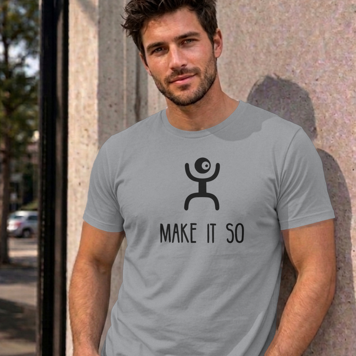 Man wearing the sport grey Make It So graphic tee