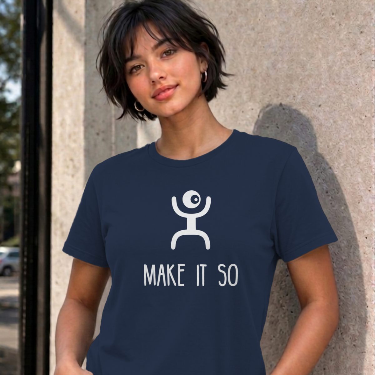Woman wearing the navy Make It So graphic tee
