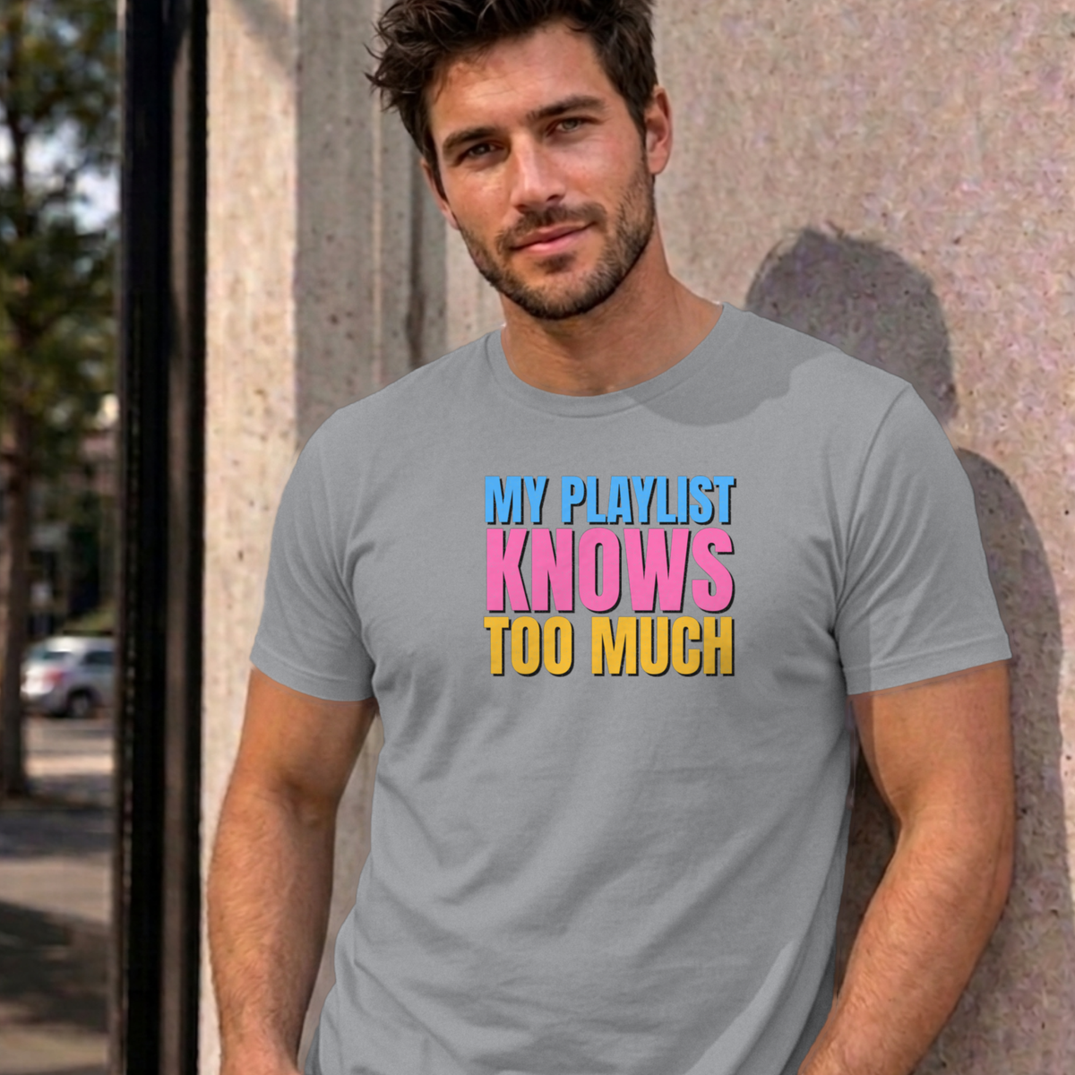 Man wearing the sport grey My Playlist Knows Too Much graphic tee