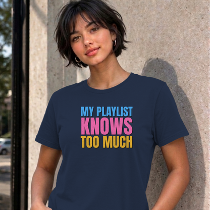 Woman wearing the navy My Playlist Knows Too Much graphic tee
