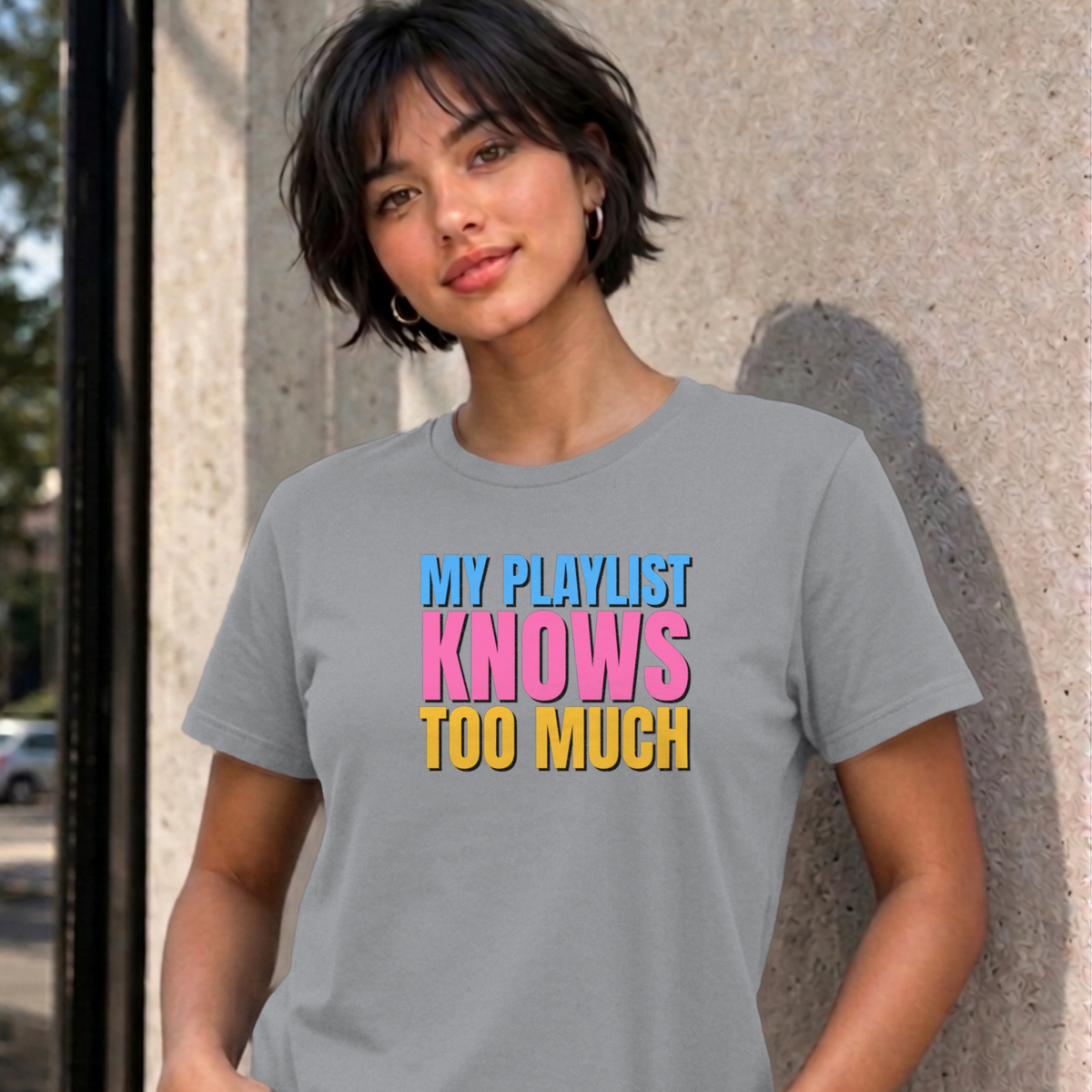 Woman wearing the sport grey My Playlist Knows Too Much graphic tee