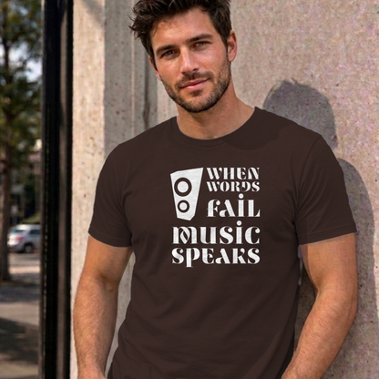 Man wearing the dark chocolate Music Speaks graphic tee