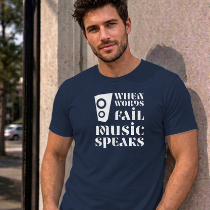 Man wearing the navy Music Speaks graphic tee