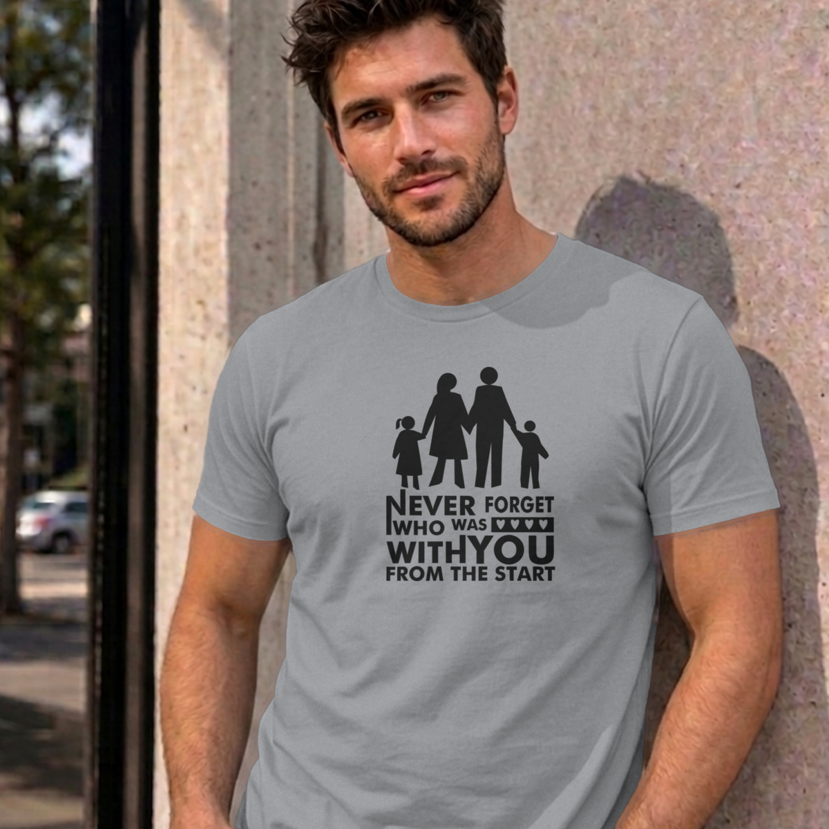Man wearing the sport grey Never Forget Family graphic tee