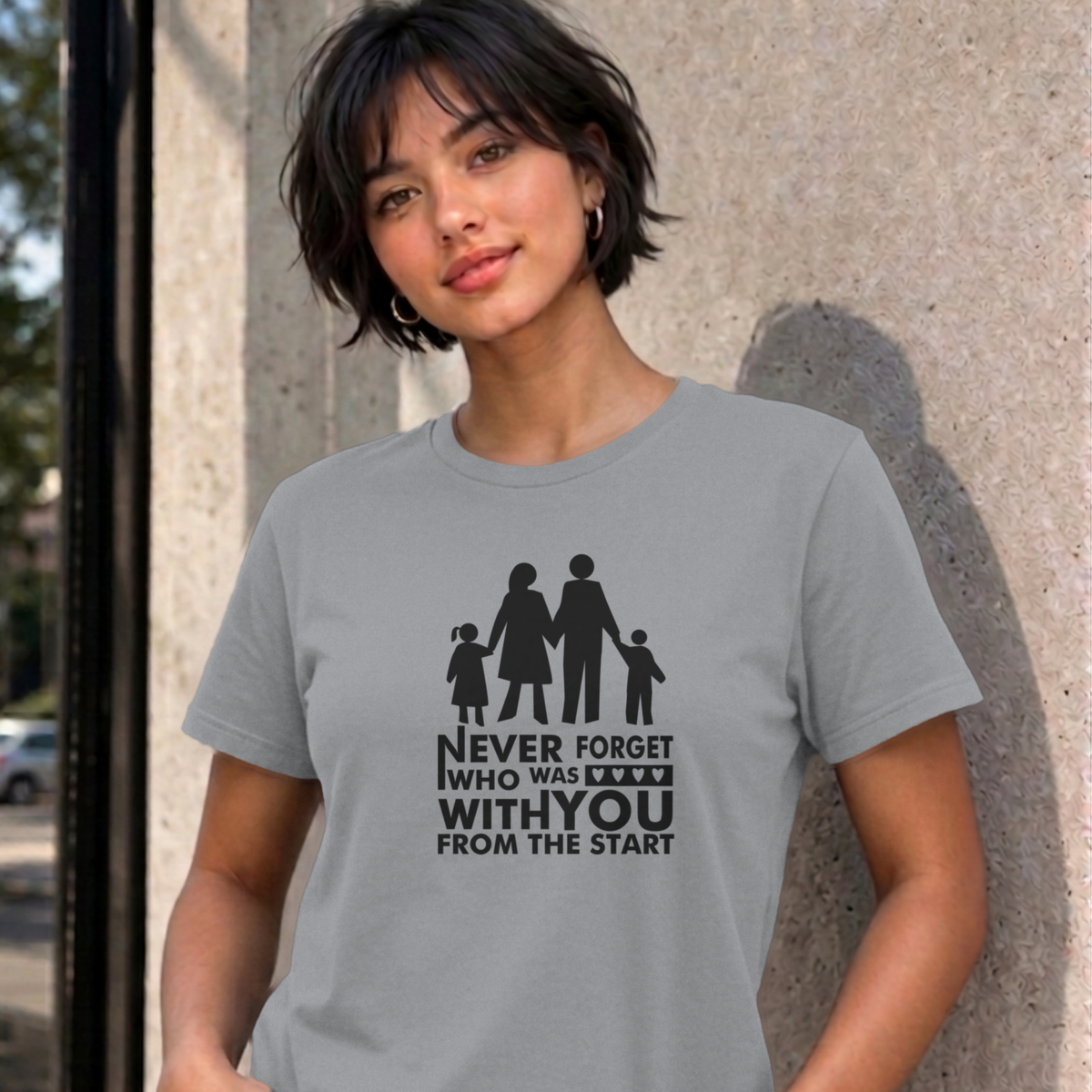 Woman wearing the sport grey Never Forget Family graphic tee