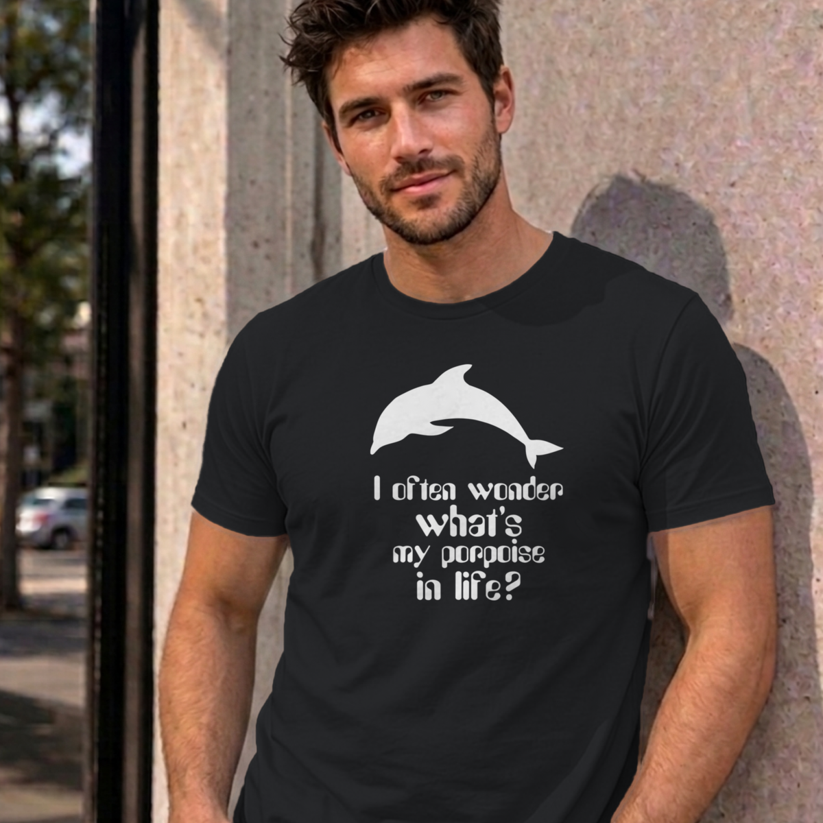 Man wearing the black I Often Wonder graphic tee