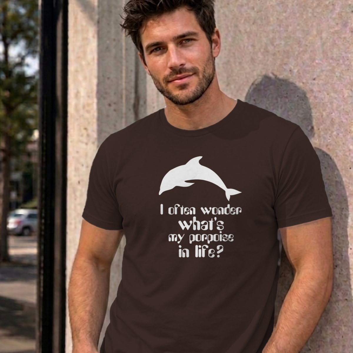 Man wearing the dark chocolate I Often Wonder graphic tee