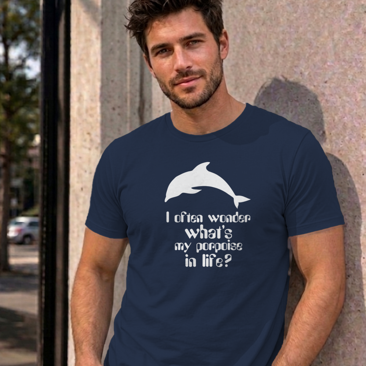 Man wearing the navy I Often Wonder graphic tee
