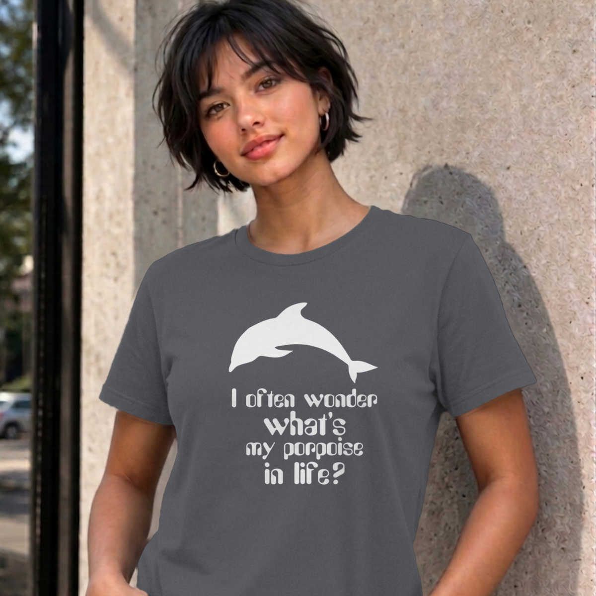 Woman wearing the charcoal I Often Wonder graphic tee