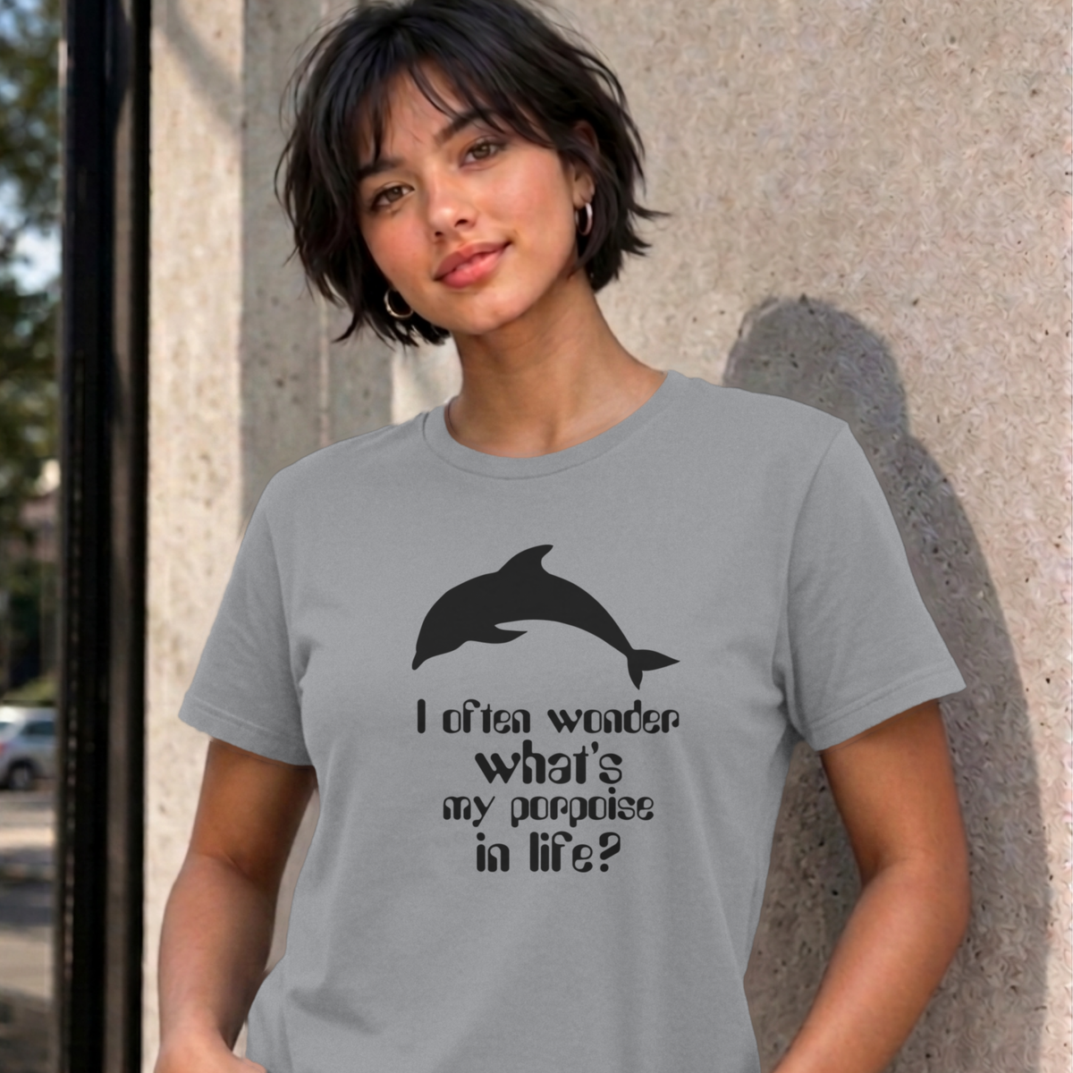 Woman wearing the sport grey I Often Wonder graphic tee