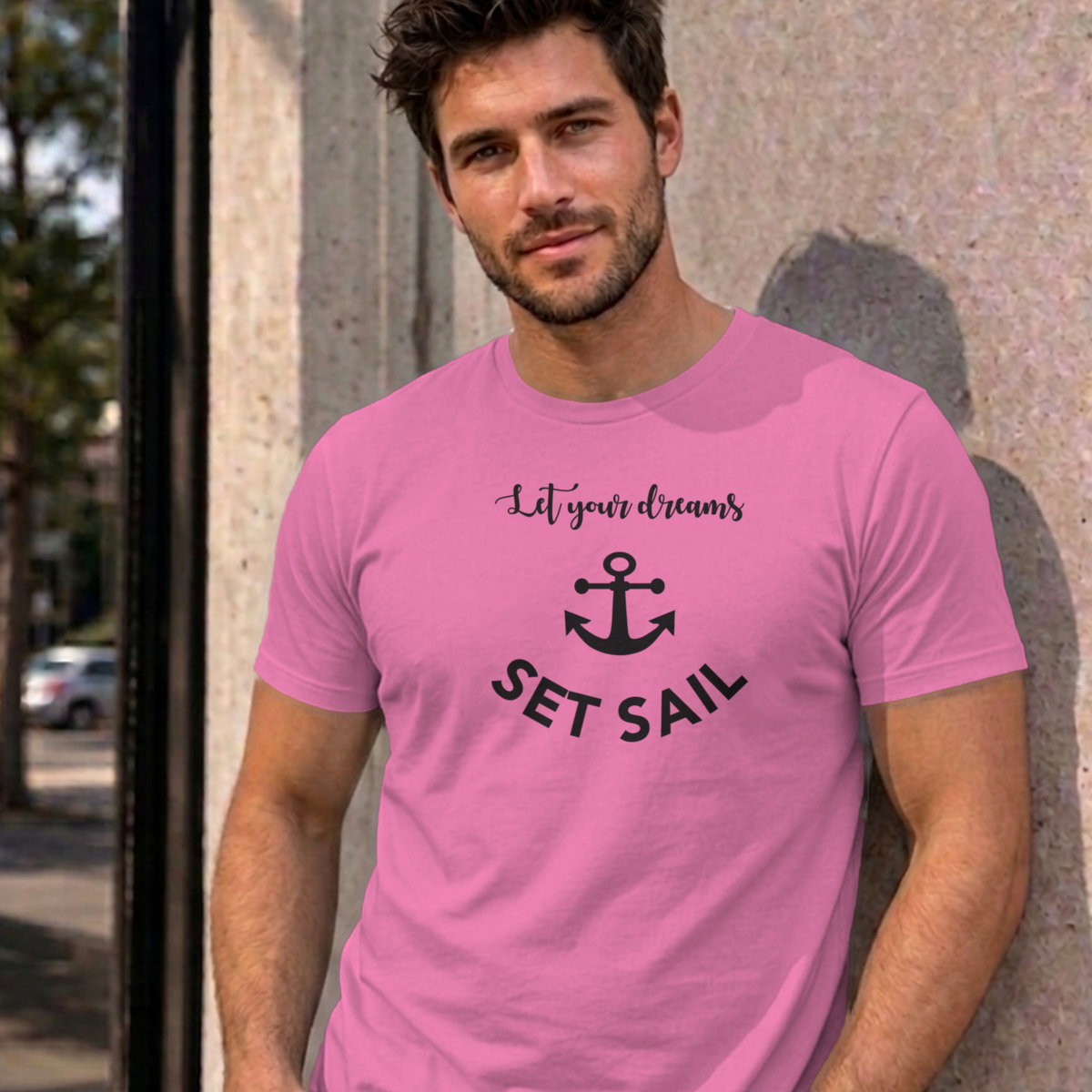 Man wearing the azalea Let Your Dreams Set Sail graphic tee
