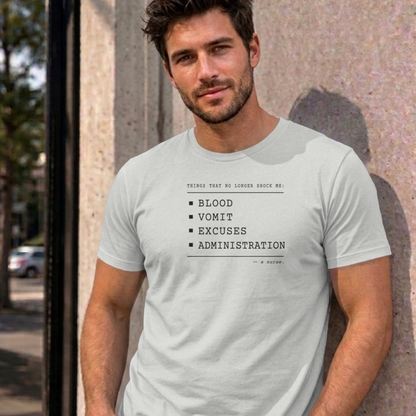 Man wearing the ash Nurse No Longer Shocked graphic tee