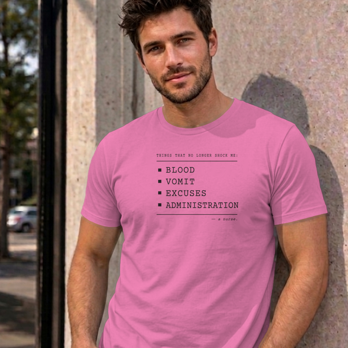 Man wearing the azalea Nurse No Longer Shocked graphic tee