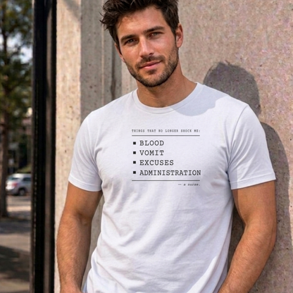 Man wearing the white Nurse No Longer Shocked graphic tee