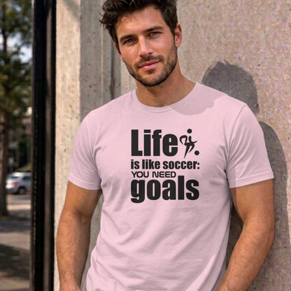 Man wearing the light pink Life Is Like Soccer graphic tee