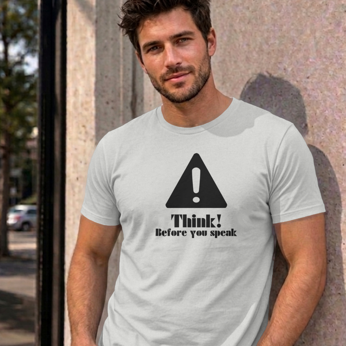 Man wearing the ash Think Before You Speak graphic tee
