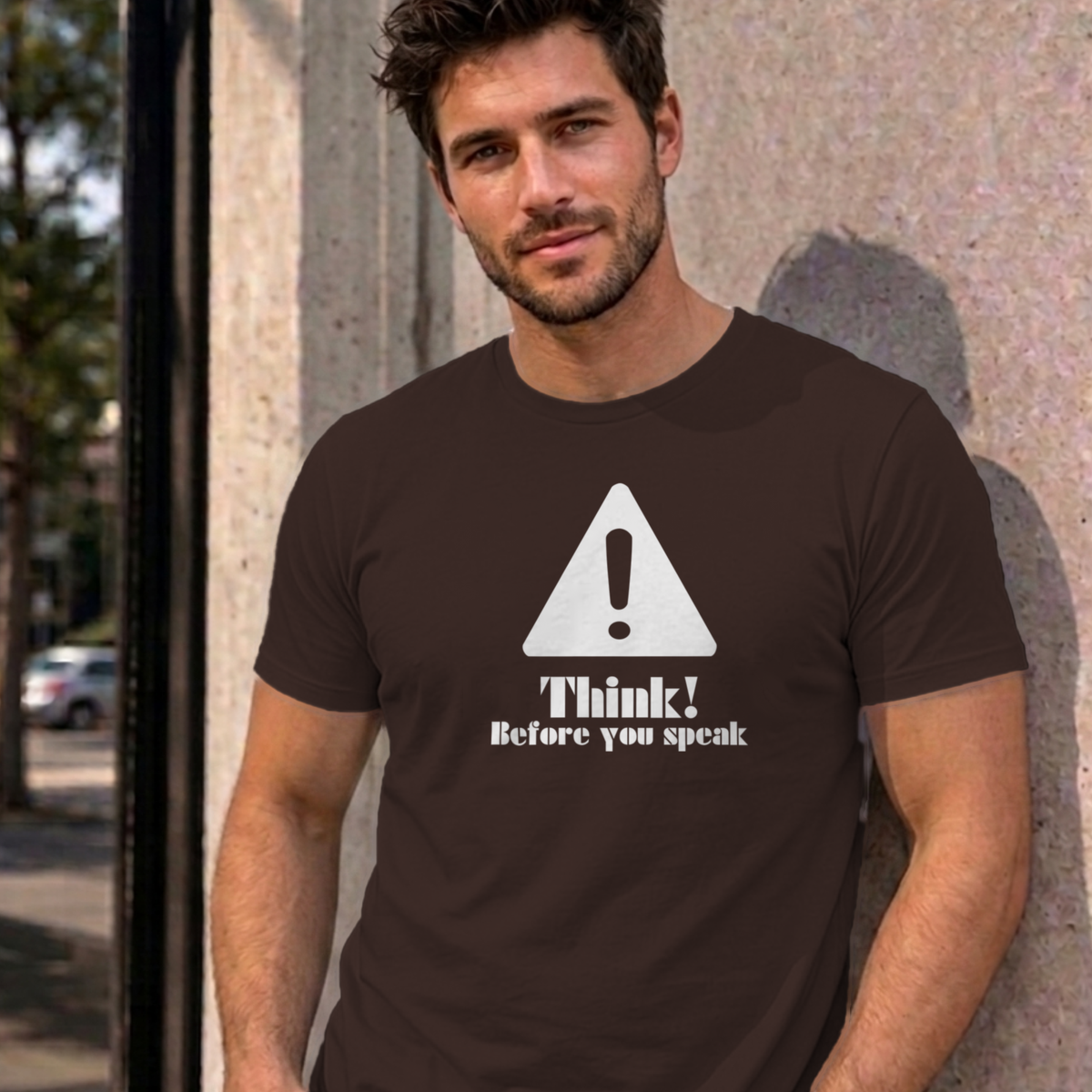 Man wearing the dark chocolate Think Before You Speak graphic tee