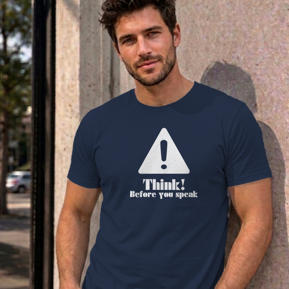 Man wearing the navy Think Before You Speak graphic tee