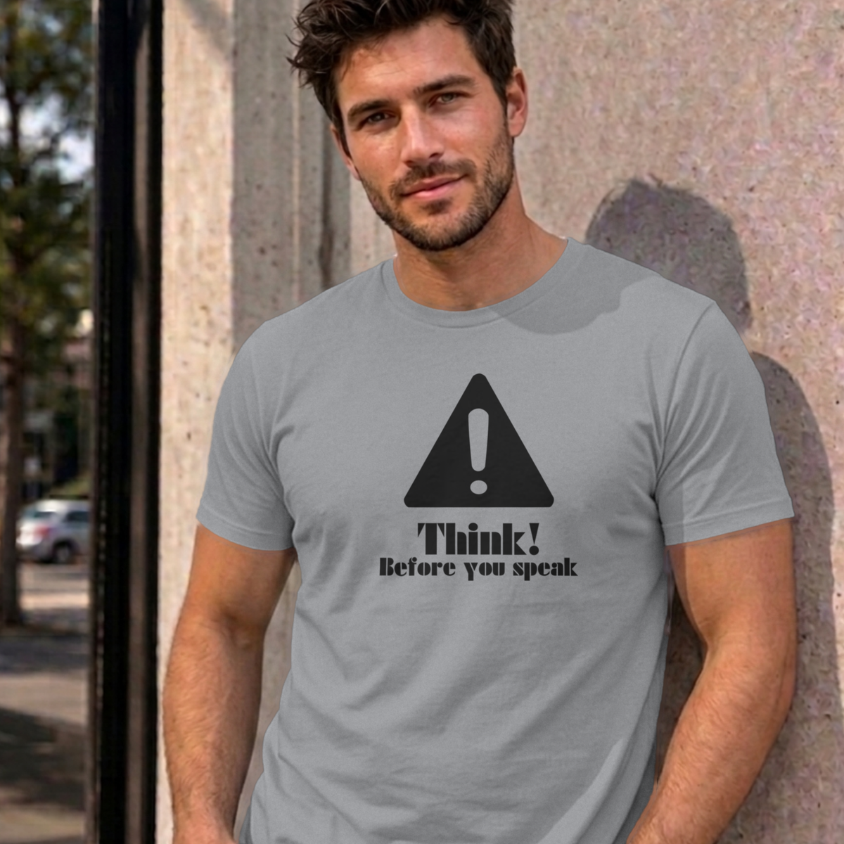 Man wearing the sport grey Think Before You Speak graphic tee