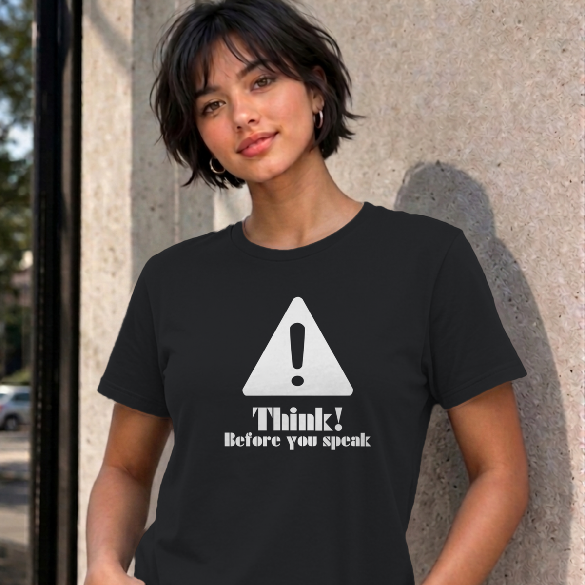 Woman wearing the black Think Before You Speak graphic tee