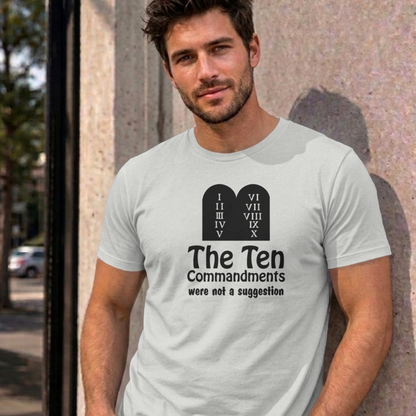 Man wearing the ash Ten Commandments graphic tee