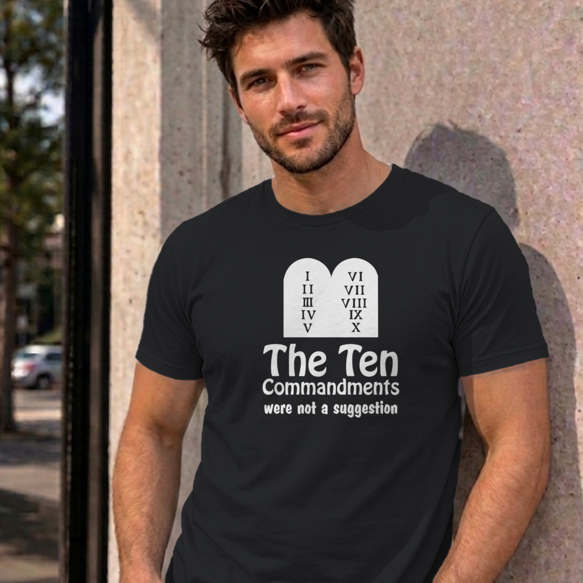 Man wearing the black Ten Commandments graphic tee