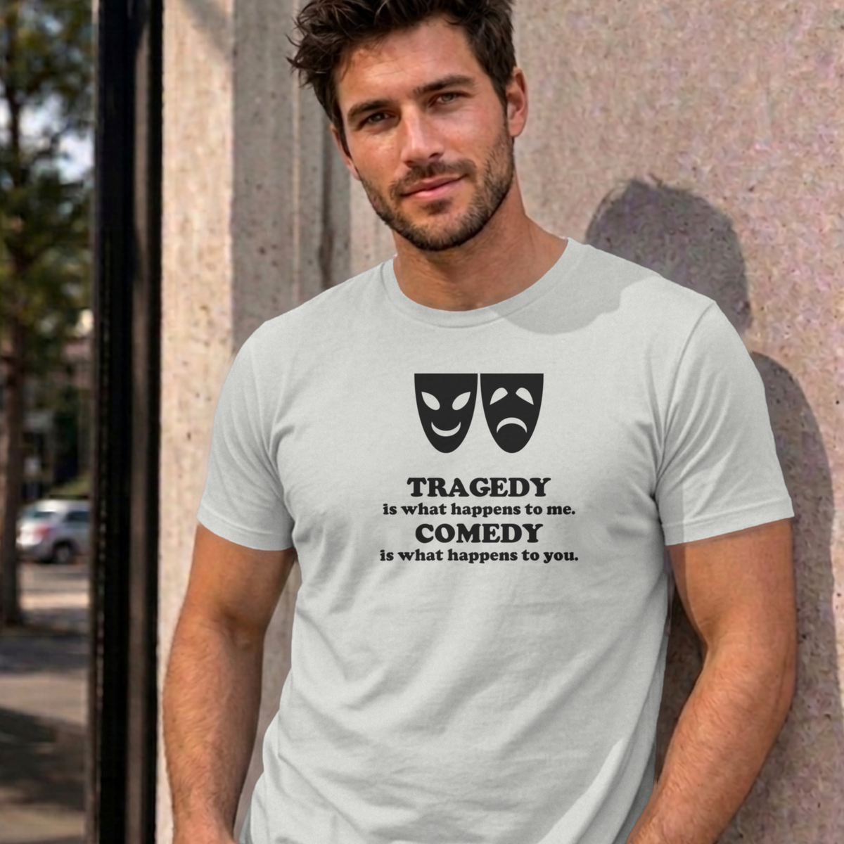 Man wearing the ash Tragedy and Comedy graphic tee