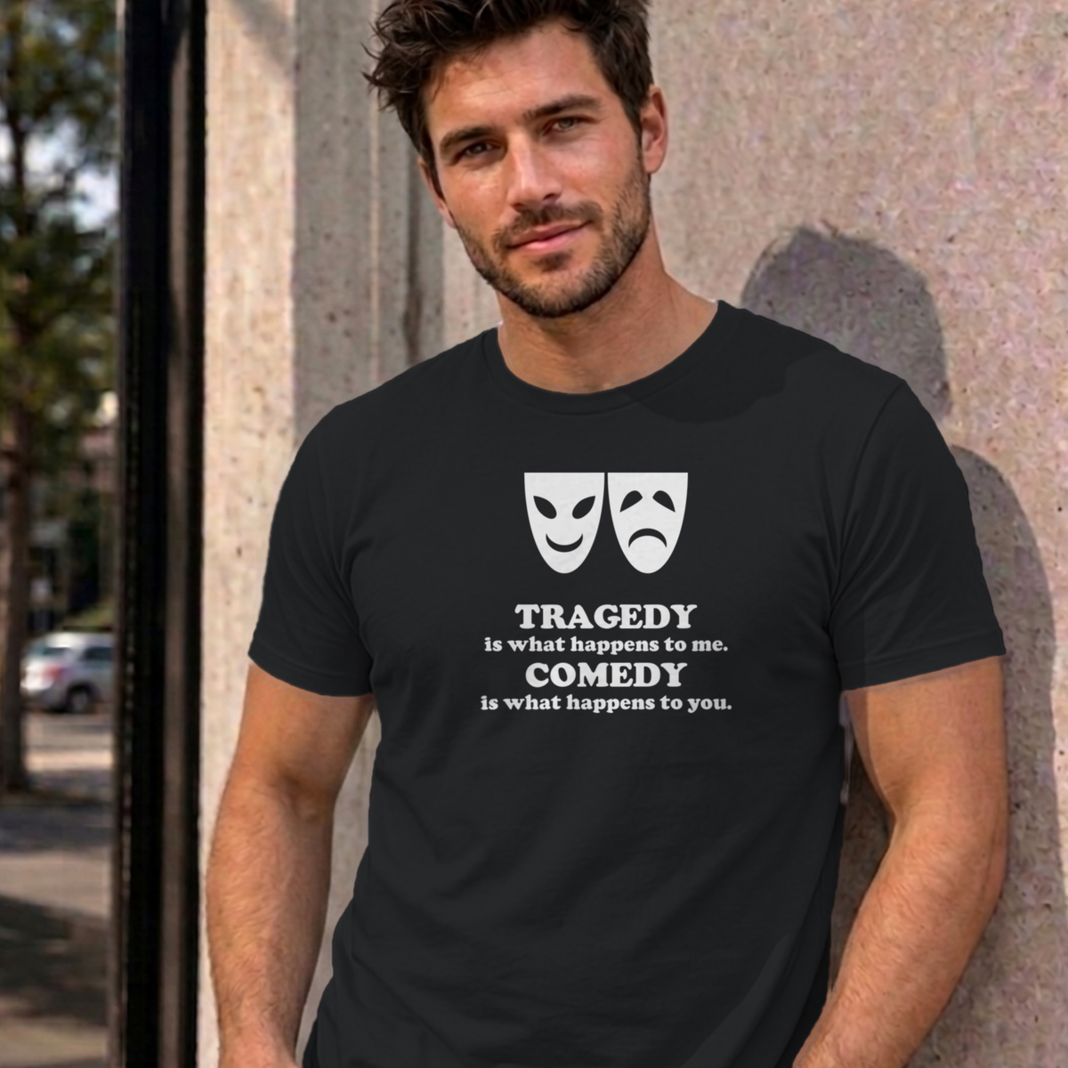 Man wearing the black Tragedy and Comedy graphic tee