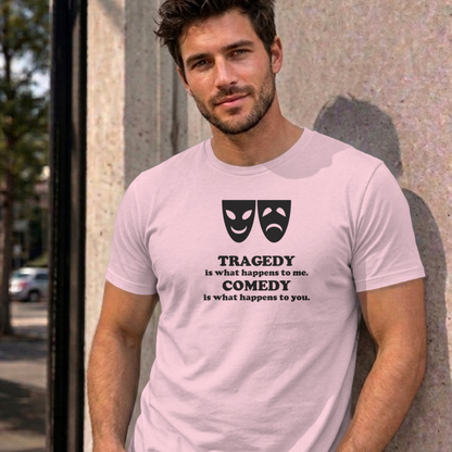 Man wearing the light pink Tragedy and Comedy graphic tee