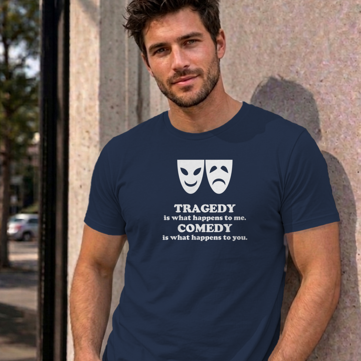 Man wearing the navy Tragedy and Comedy graphic tee