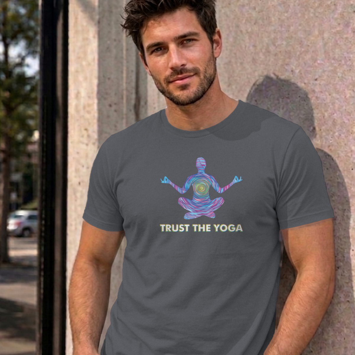 Man wearing the charcoal Trust the Yoga graphic tee