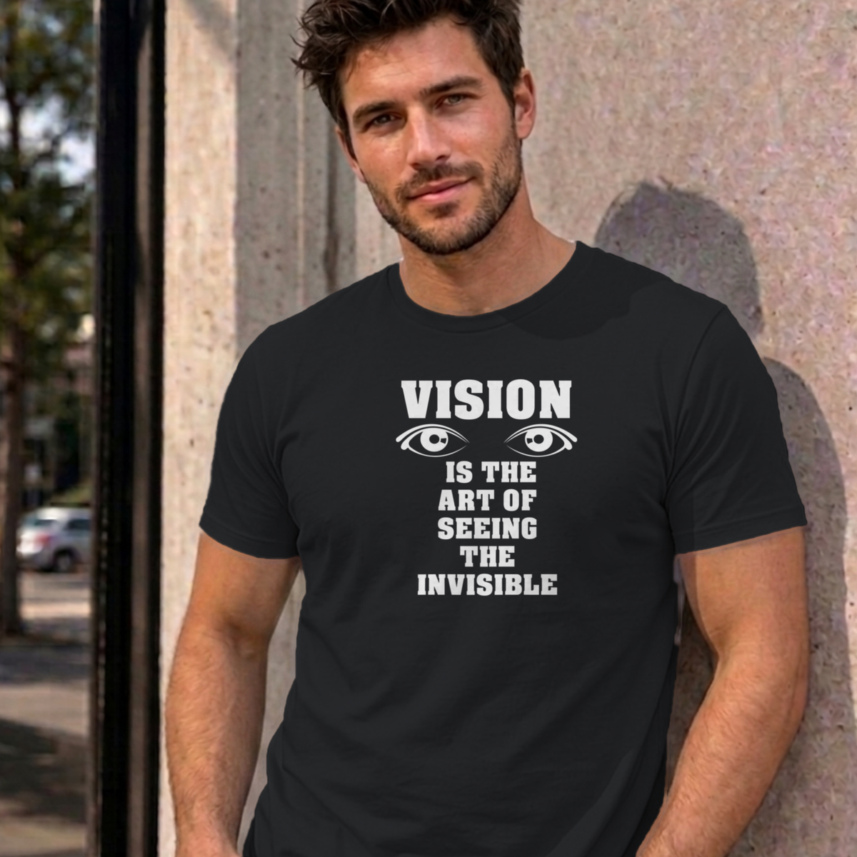 Man wearing the black Vision graphic tee