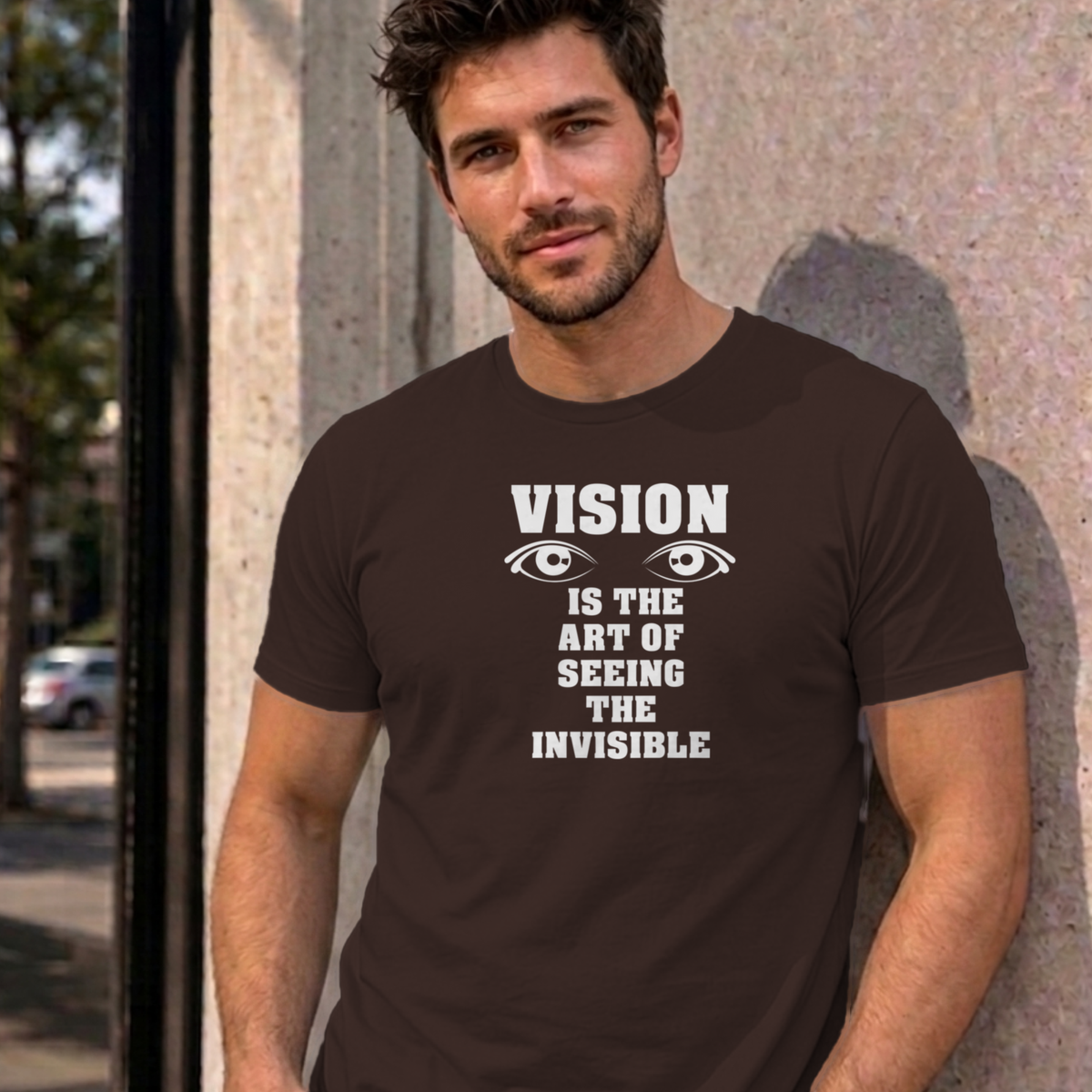 Man wearing the dark chocolate Vision graphic tee