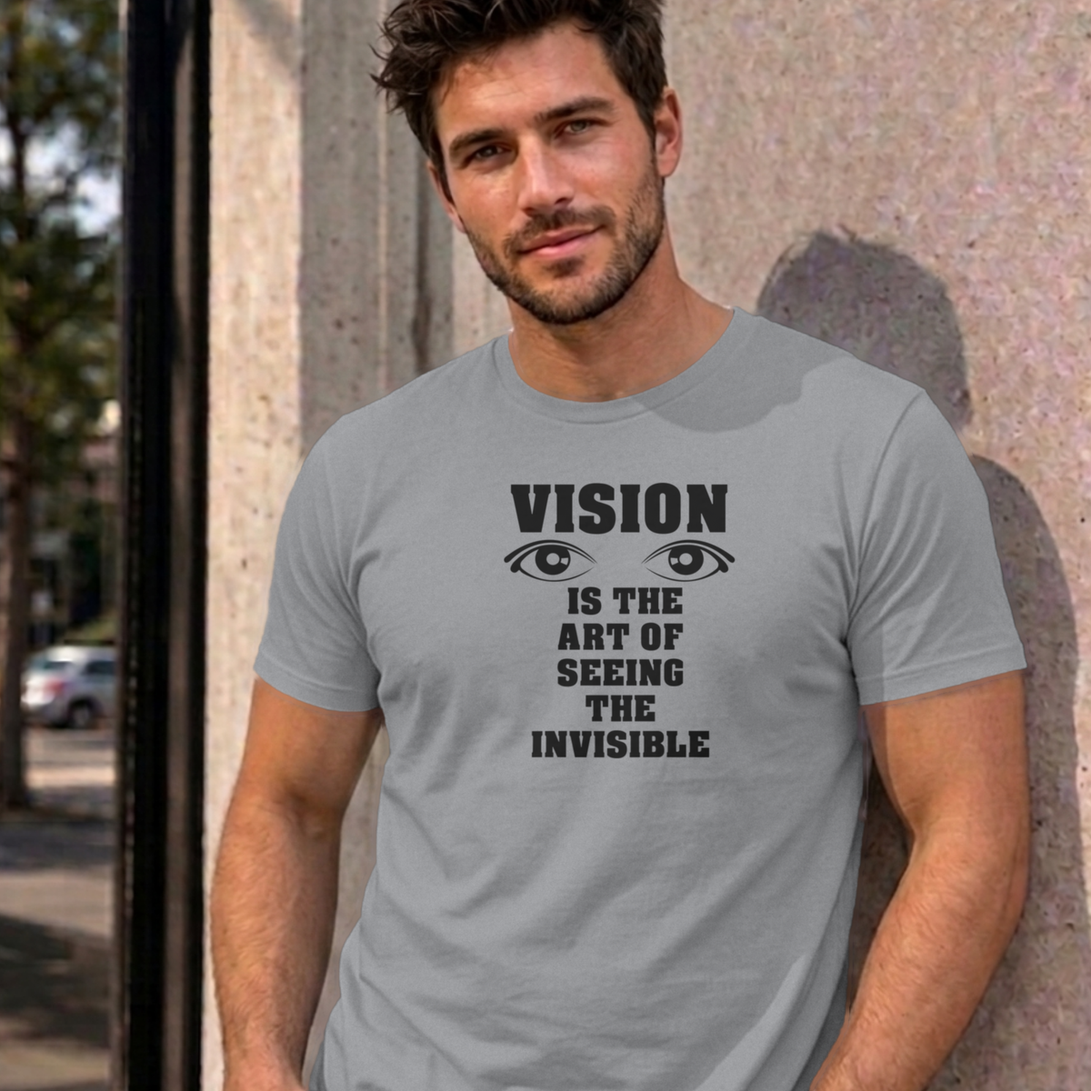 Man wearing the sport grey Vision graphic tee