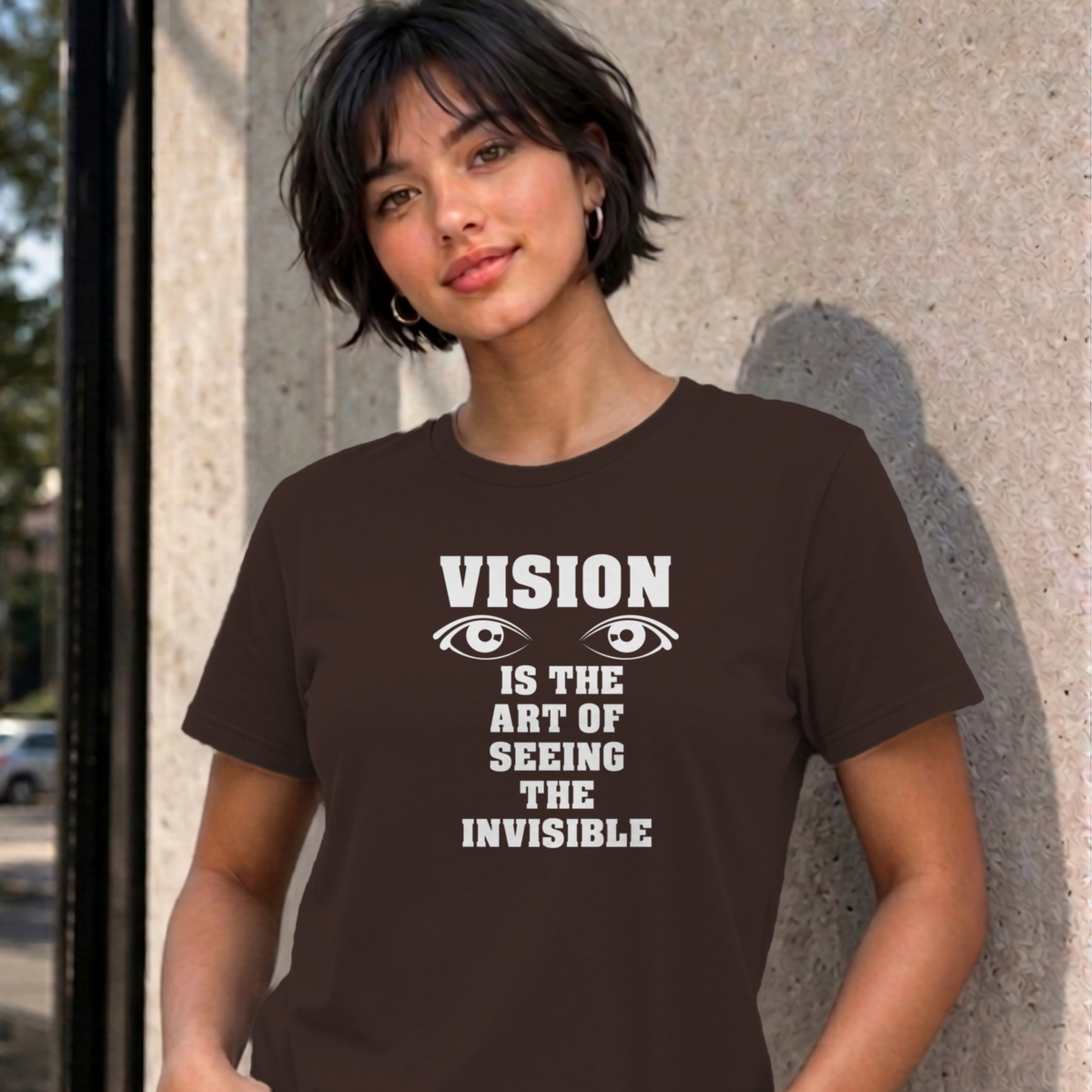 Woman wearing the dark chocolate Vision graphic tee