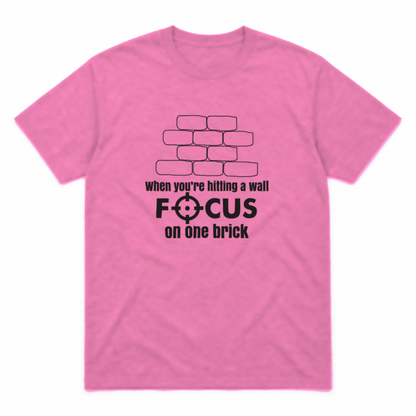 Focus on One Brick graphic tee in azalea with black print, front view