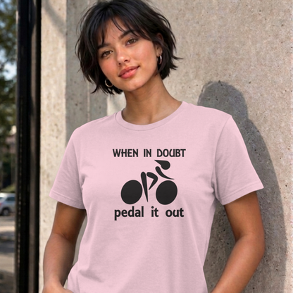 Woman wearing the light pink Pedal It Out graphic tee
