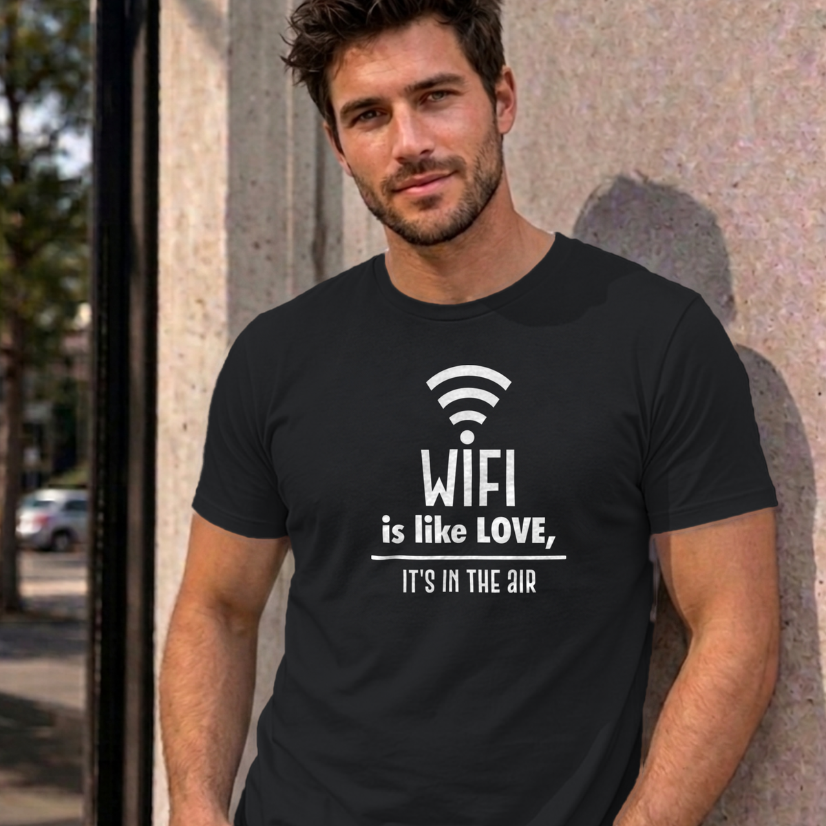 Man wearing the black Wifi Is Like Love graphic tee